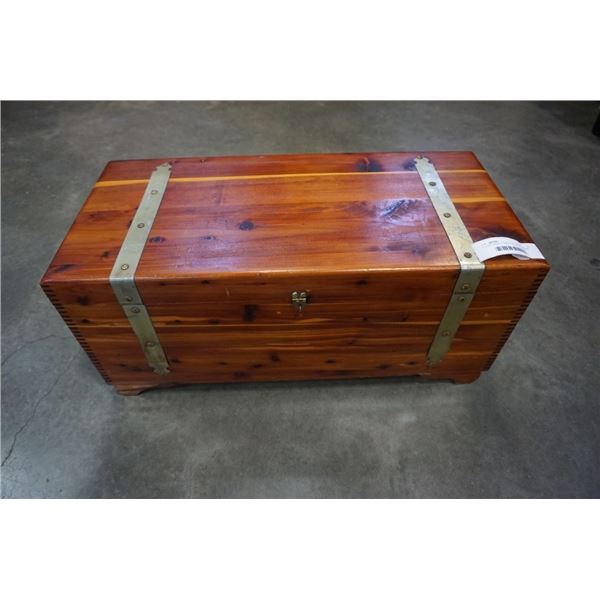 2 FOOT WIDE 11 INCH TALL WOOD TRUNK WITH BRASS ACCENTS