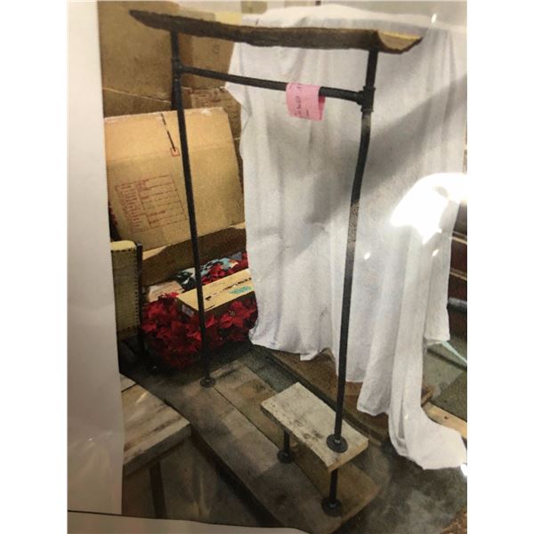 Reclaimed wood, pipe & stump clothing rack from the love show