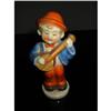 Porcelain figurine boy is playing musical! #1913204