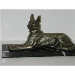 Reclining dog on marble base #1940805