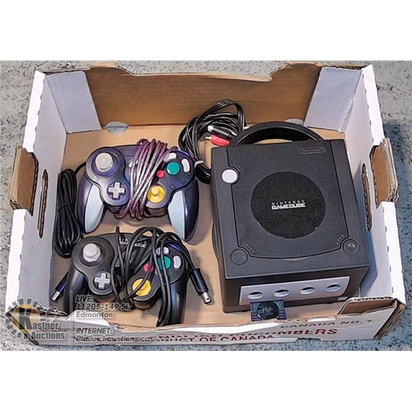 GAMECUBE CONSOLE WITH CORDS AND 2 CONTROLLERS.