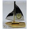 Image 1 : UNCLAIMED HEAVY SILVER & BRASS SAIL BOAT CLOCK