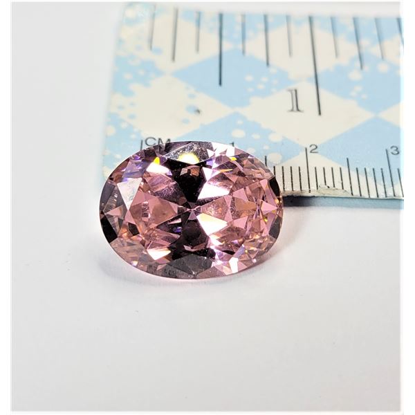 4)  LAB CREATED OVAL PALE PINK SAPPHIRE