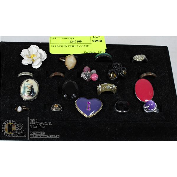 18 RINGS IN DISPLAY CASE