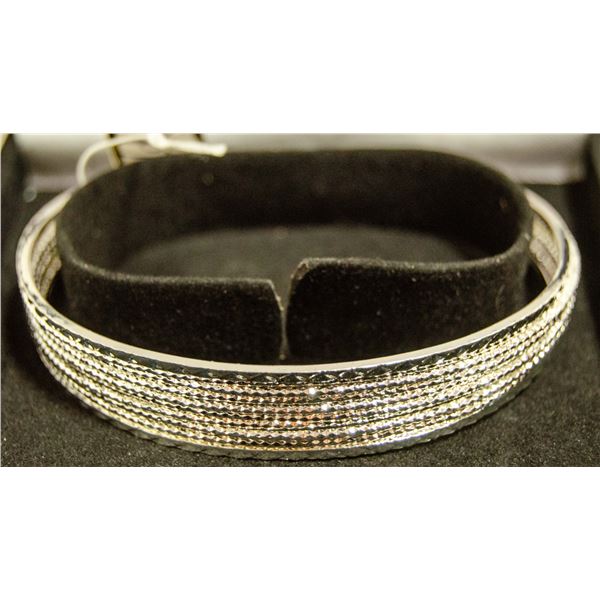 NEW SILVER PLATED LADIES BANGLE , IN VELET BLACK