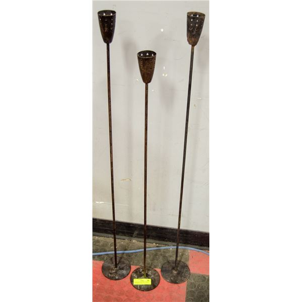 THREE WROUGHT IRON CANDLE HOLDERS, 36" - 40"