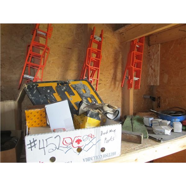 CONTENTS ON WEST WALL OF STORAGE BUILDING INCLUDING