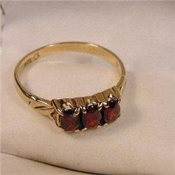 Garnet and Gold Three Stone Bridge Ring. #1943200