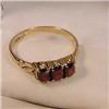 Image 1 : Garnet and Gold Three Stone Bridge Ring. #1943200