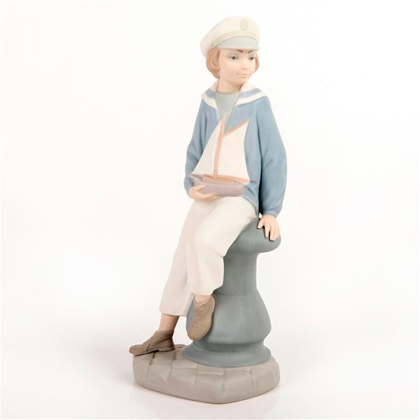Boy with Yacht 1014810 - Lladro Porcelain Figurine