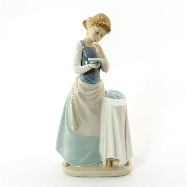 Girl Ironing 1004981 - Lladro Porcelain Figurine