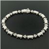 Image 1 : 14K White Gold 7.25" 1.30 ctw Round Diamond Cluster & Ribbed Link Tennis Bracele