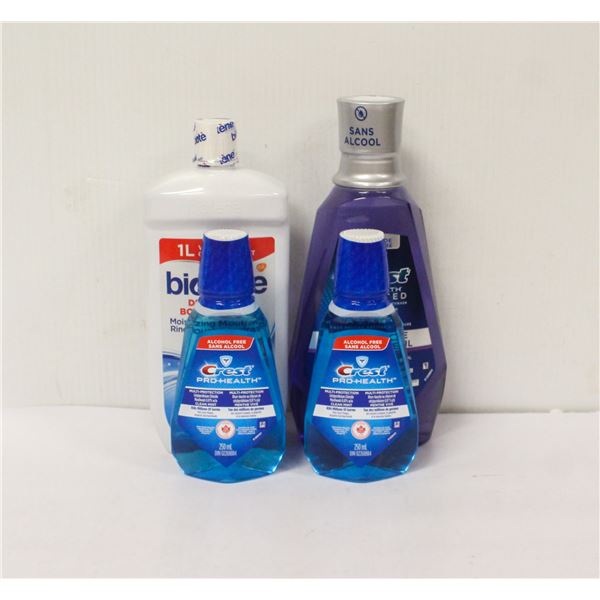 4 ASSORTED BOTTLES OF MOUTH WASH