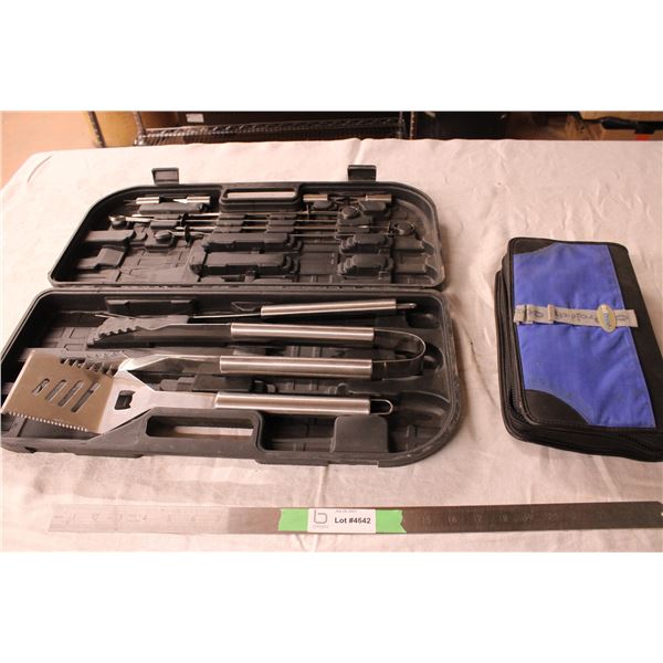 DVDs in Organizer and BBQ Grilling Set in Case