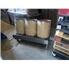 Image 1 : 3 BARREL ROLLING RACK WITH 3 BULK BARRELS
