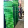 Image 1 : Large lot of stacking green totes, assorted conditions from good to poor, and some broken approx 100