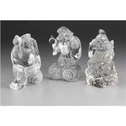 Group of three rock crystal figures