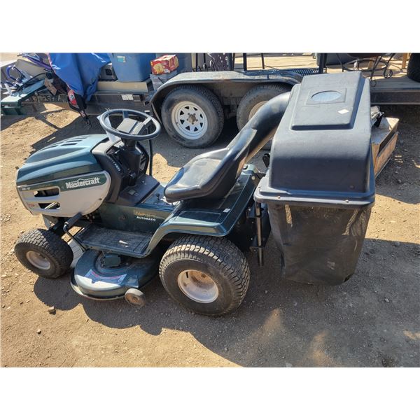 16HP 42" Mastercraft Ride Mower complete with double bagger attachment (has key)