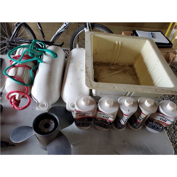 Large tote full of misc. boating supplies - Radio, buoys, Live well, prop, misc. chrome pieces, unop