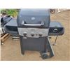 Image 1 : Uniflame BBQ works & comes with tank