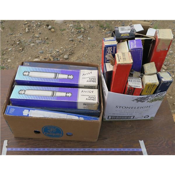 Lot of Boxes of Vintage Car Shocks