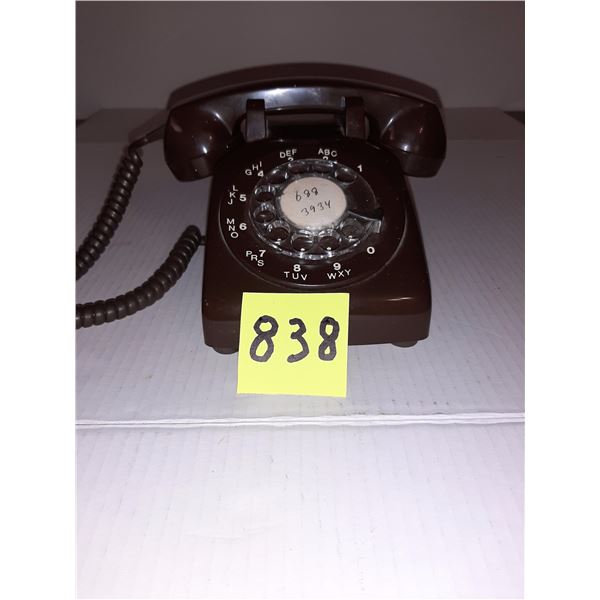 Brown rotary desk phone