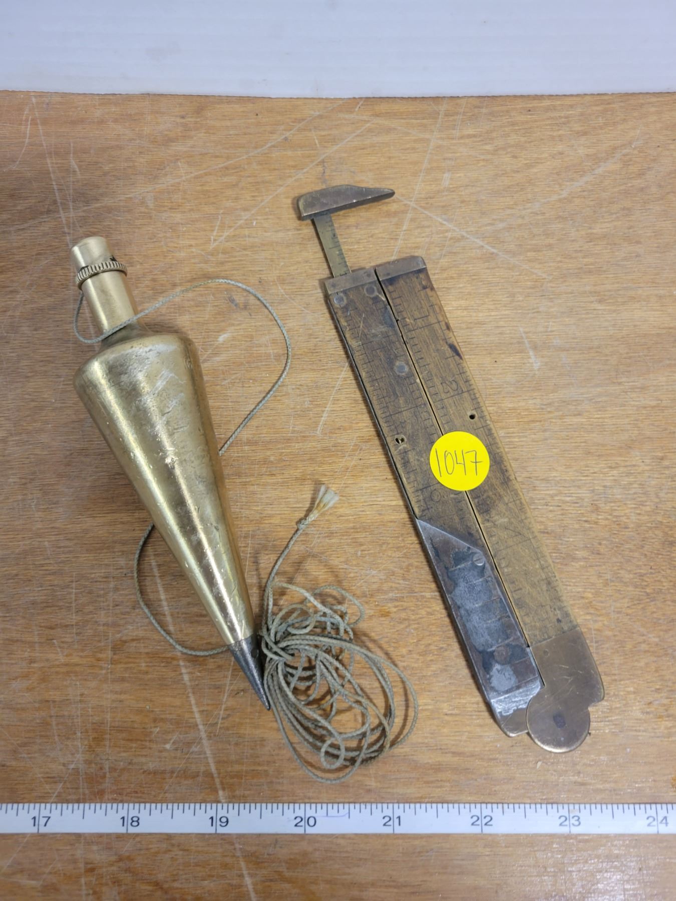 large brass plumb bob & 12" brass wood ruler Schmalz Auctions