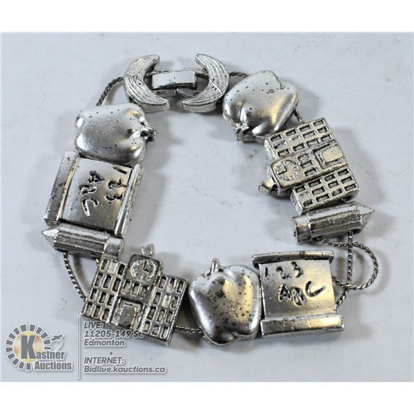 SCHOOL TEACHER BRACELET WITH VARIOUS CHARMS