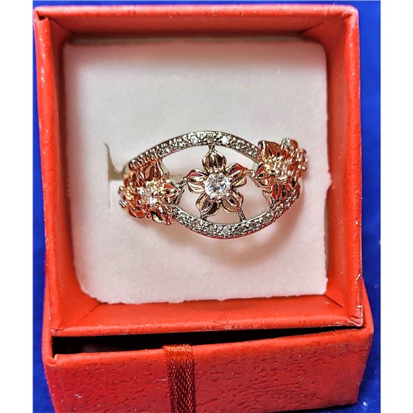 16)  SILVER TONE AND ROSE GOLD TONE AND CLEAR