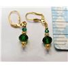 Image 1 : 19)  GOLD TONE AND EMERALD GREEN SWAROVSKI