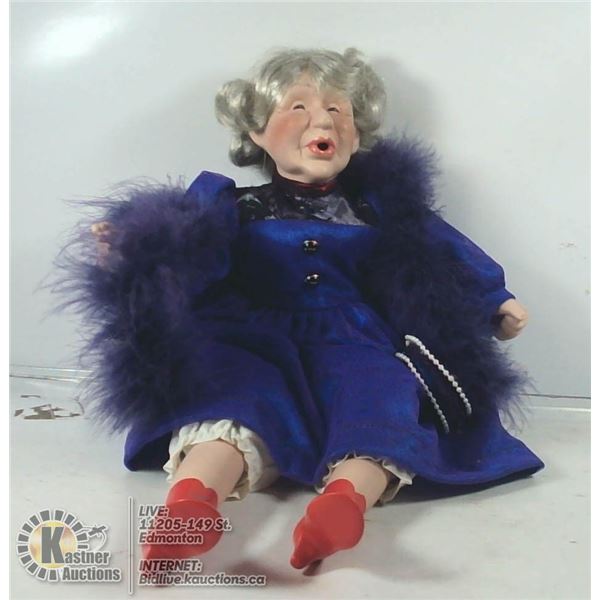 THE LADY IN THE PURPLE DRESS PORCELAIN DOLL.
