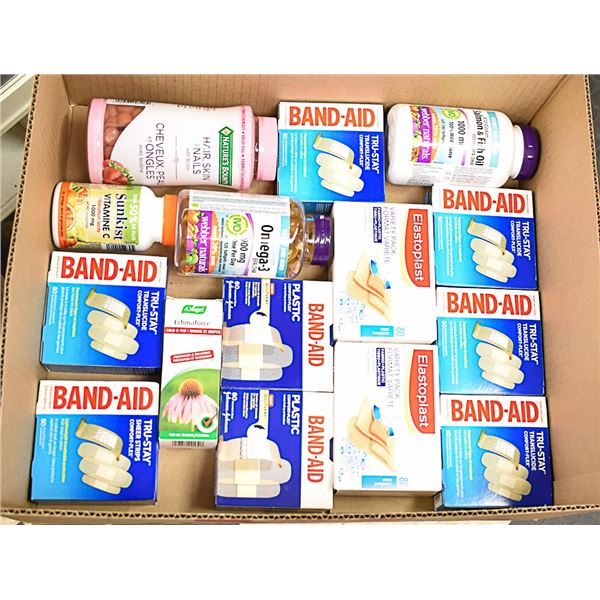 FLAT OF BRAND NAME VITAMINS AND BAND-AID LOT