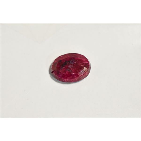 ONE OVAL CUT RUBY, MEASURING 18 X 14 X 5.5 EXACT