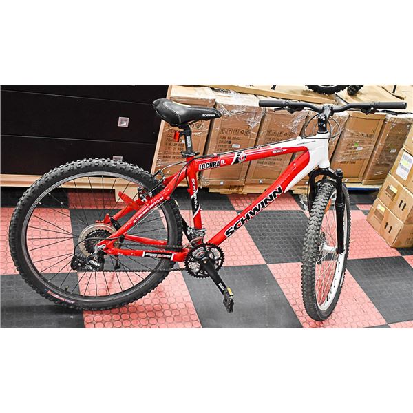 SCHWINN 24 SPEED FRONT SHOCKS AND DISC BREAKS BIKE