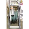 Image 1 : WATER HOSE DOLLY WITH HOSE AND SPRINKLER
