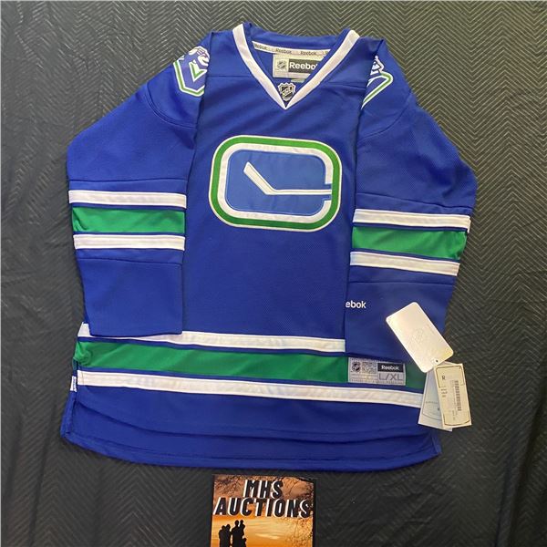VANCOUVER CANUCKS YOUTH JERSEY BRAND NEW WITH TAGS