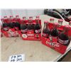 Image 2 : Approx 30 Coke Bottles- Many are Full & 5 Carriers, Plus Coke Tray, Featuring 6 Full Bottles of 1999