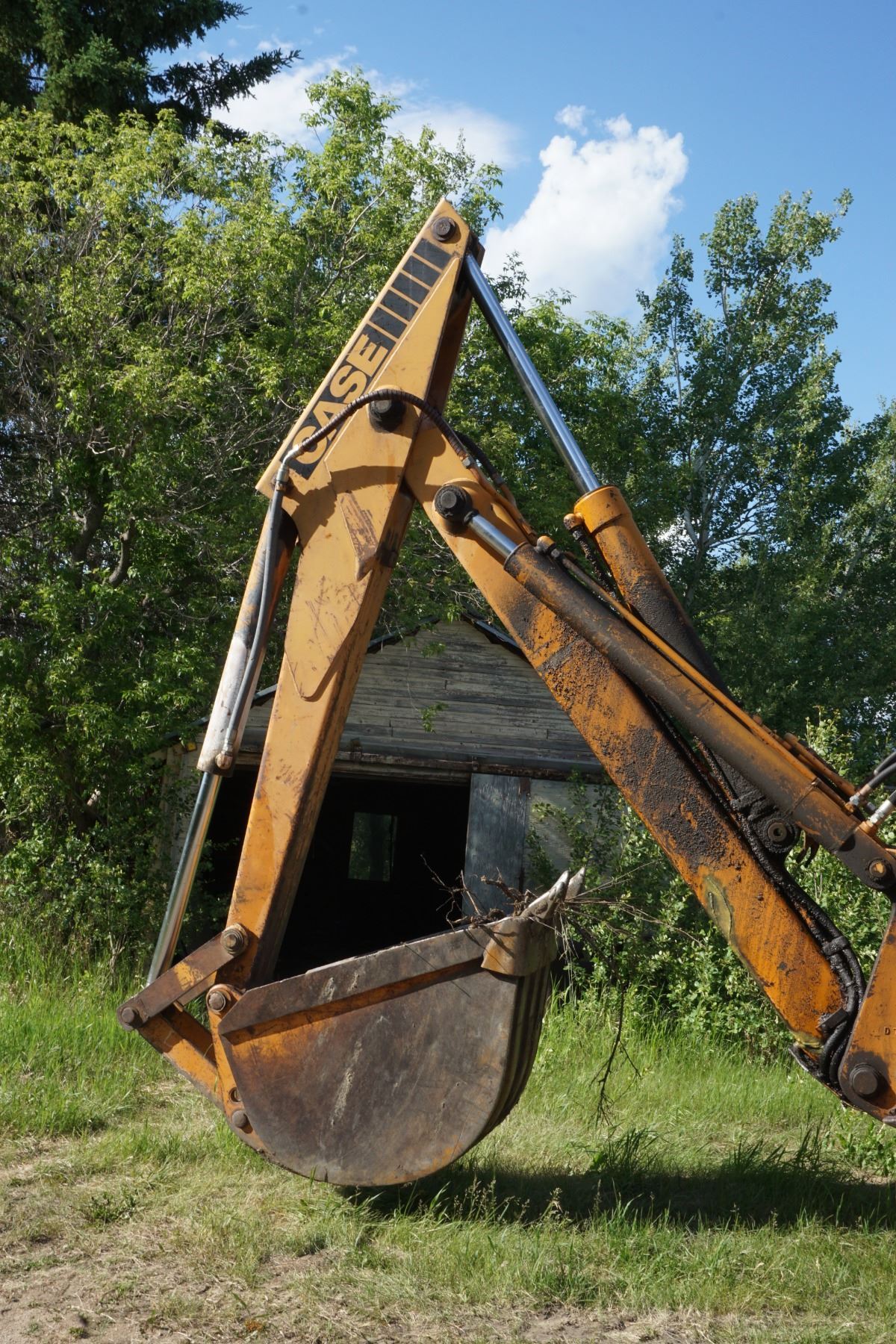 1981 780 Case Back Hoe with loader bucket, 3 backhoe buckets