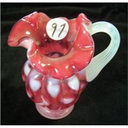 097: 5" Fenton cranberry opalescent creamer