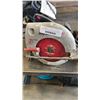 Image 2 : Skilsaw circular saw with hilti angle grinder both working