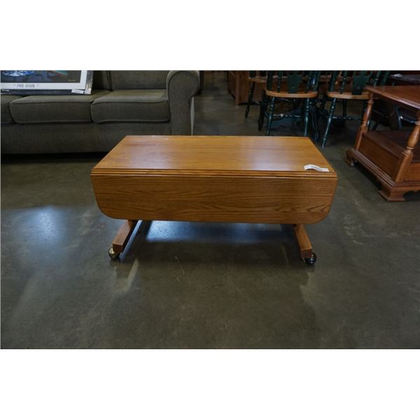 DROPLEAF SPRING LOADED OAK COFFEE TABLE/DINING TABLE