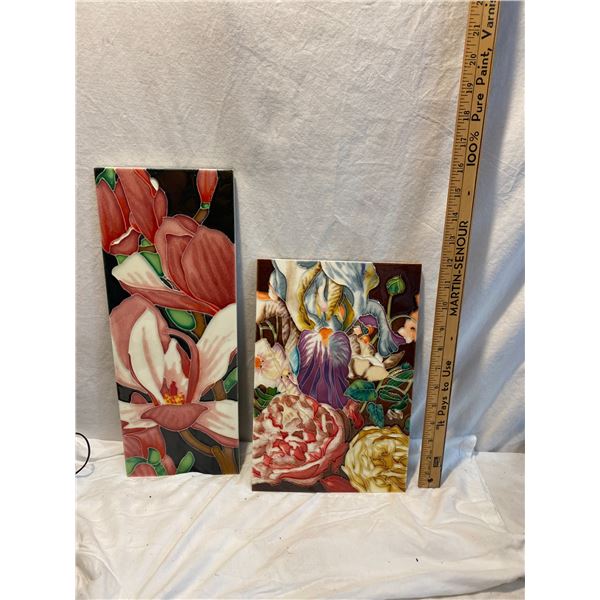 Two tile wall hangings
