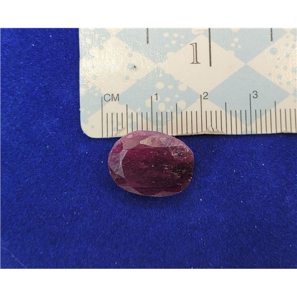 20)  OVAL FACETTED 19.4 CT NATURAL RUBY