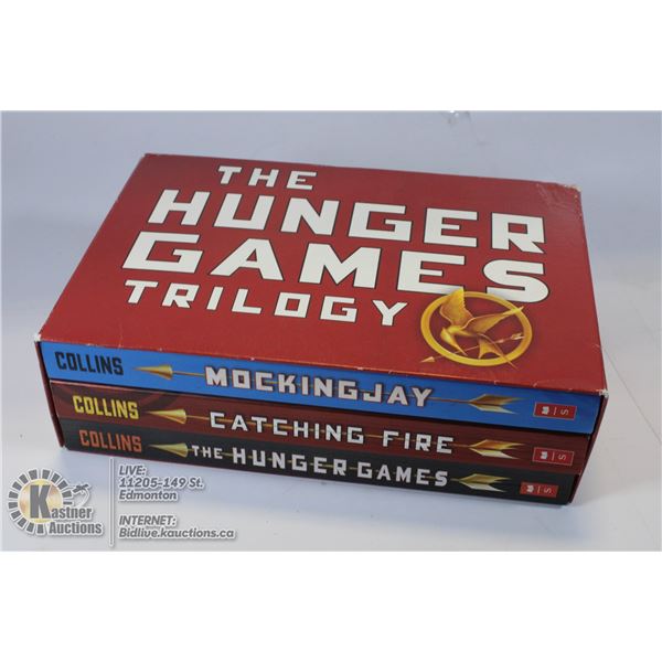 THE HUNGER GAMES COMPLETE BOX SET, SOFT COVER.