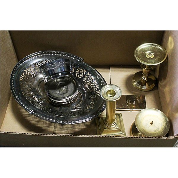 BRASS CANDLE HOLDERS AND SILVER COLOURED BASKETS