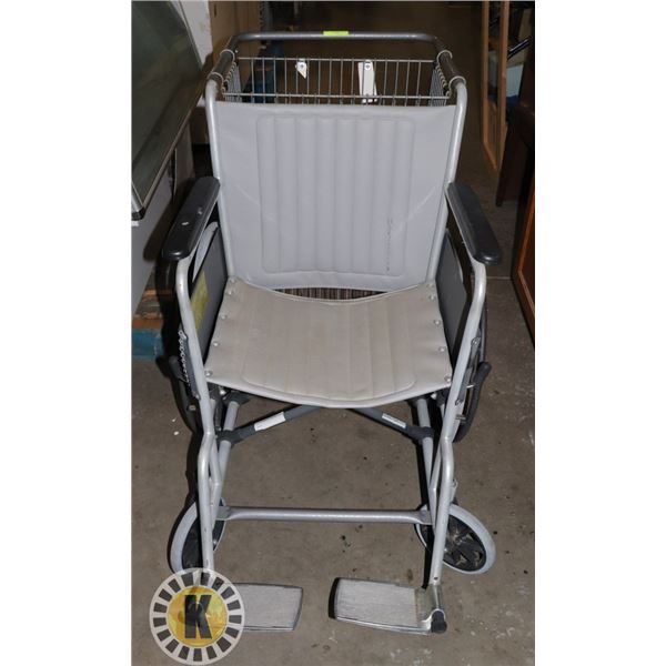 WHEELCHAIR WITH CARGO ATTACHMENT