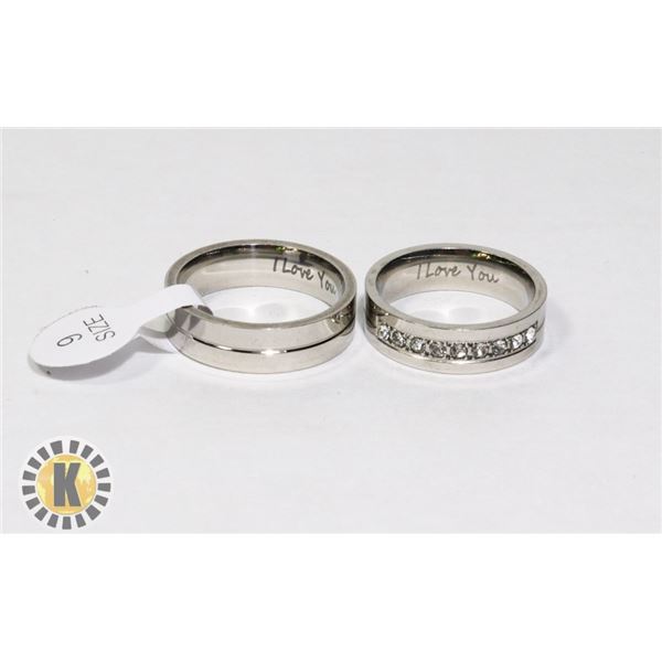 NEW STAINLESS STEEL RING SET. SAYS I LOVE YOU ON B