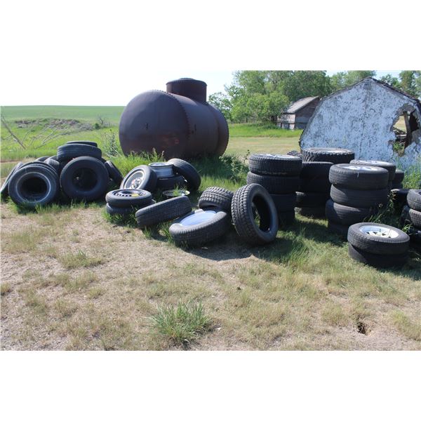 Pile of Tires and Old Truck Cap and Metal Frame