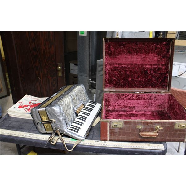 Accordion with Sheet Music in Case