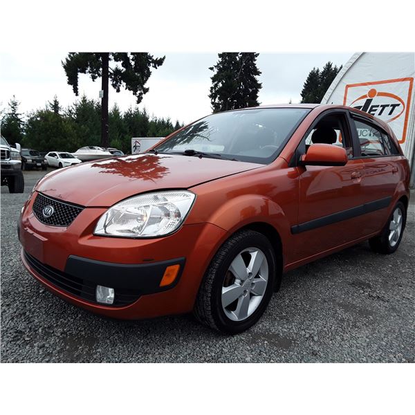 E3 --  2009 KIA RIO 5 SX  , Orange , 195856  KM's